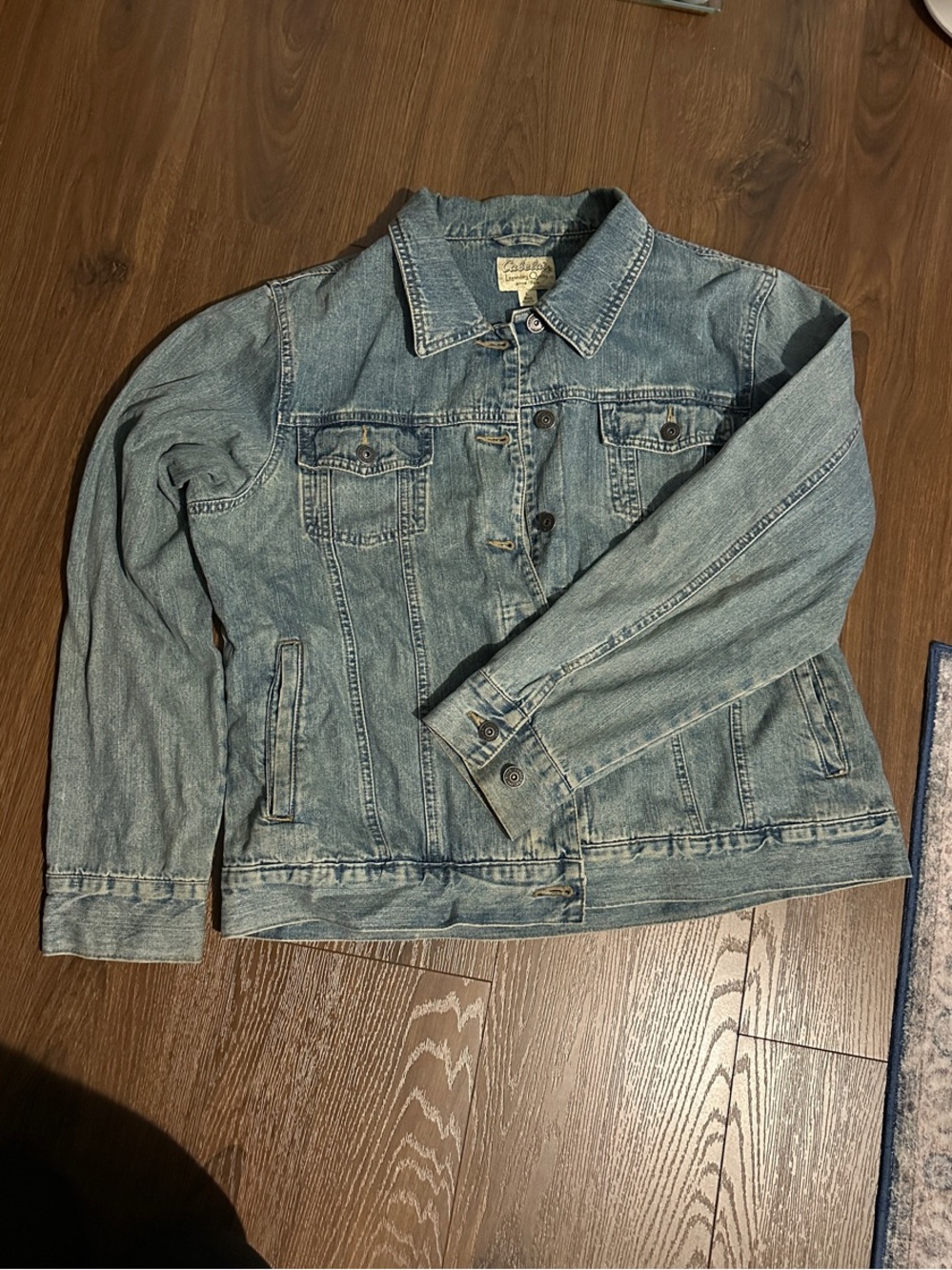 Cabela’s legendary Quality denim jacket, women’s Size Large.